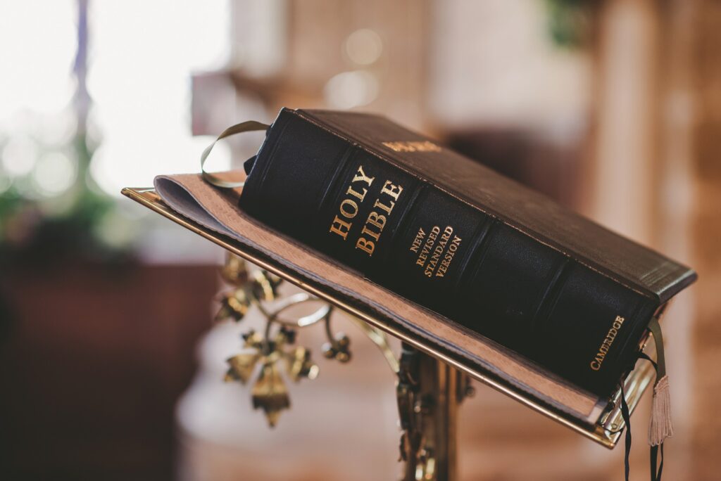 A bible sitting on a podium - NRSV