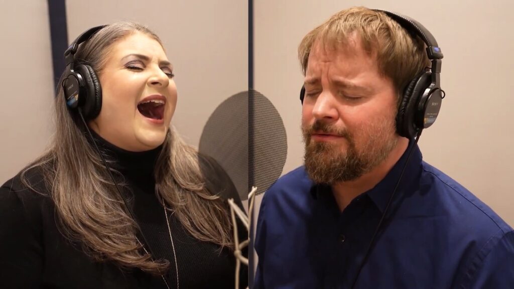 Stephen and Lisa singing for The Mountains Surround