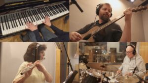 Musicians recording Psalm 122 with piano, guitar, drums, and vocals for The Mountains Surround.