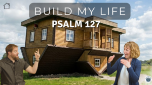 Stephen Vesolich and Dr. Stephanie Wilsey standing in front of a wooden house with the title “Build My Life Psalm 127,” promoting the Psalm 127 teaching from The Mountains Surround series.